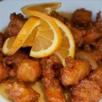 Orange Chicken · Crunchy deep-fried, topped with sweet and tangy orange glaze. Choice of jasmine or brown rice.