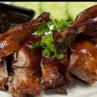 Half -- Fire Roasted Duck · Marinated and oven-roasted to perfection. Choice of jasmine or brown rice.