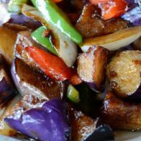 Chef'S Garlic Eggplant · Wok-fried with onions and bell peppers in our chef's special vegan garlic sauce. Choice of j...