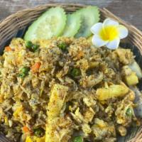 Khua Khao Mak Nad · Pineapple fried rice
ingredients: rice, pineapple, carrots, cucumber, peas, onions, cumin po...