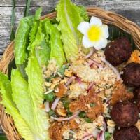 Sai Oua Luke Seen Nam Khao · Lao crispy rice salad. Ingredients: ginger, lime juice, palm sugar, fish sauce, mint, green ...