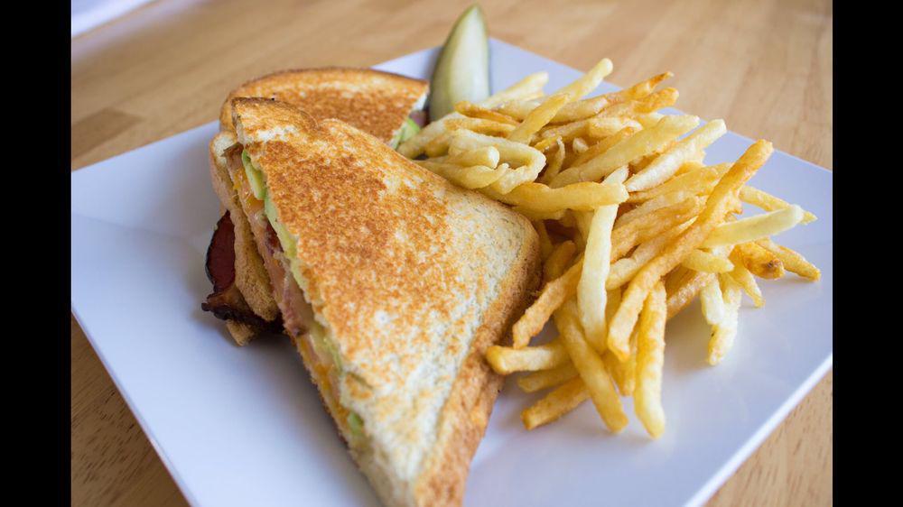 Grilled Cheese Sandwich · Bacon, avocado, tomato, melted cheddar cheese, melted jack cheese, and grilled white bread. Served with French fries.