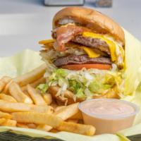 Double D · Comes well done with two patties, lettuce, tomato, pickle, fry sauce, American cheese, a hea...