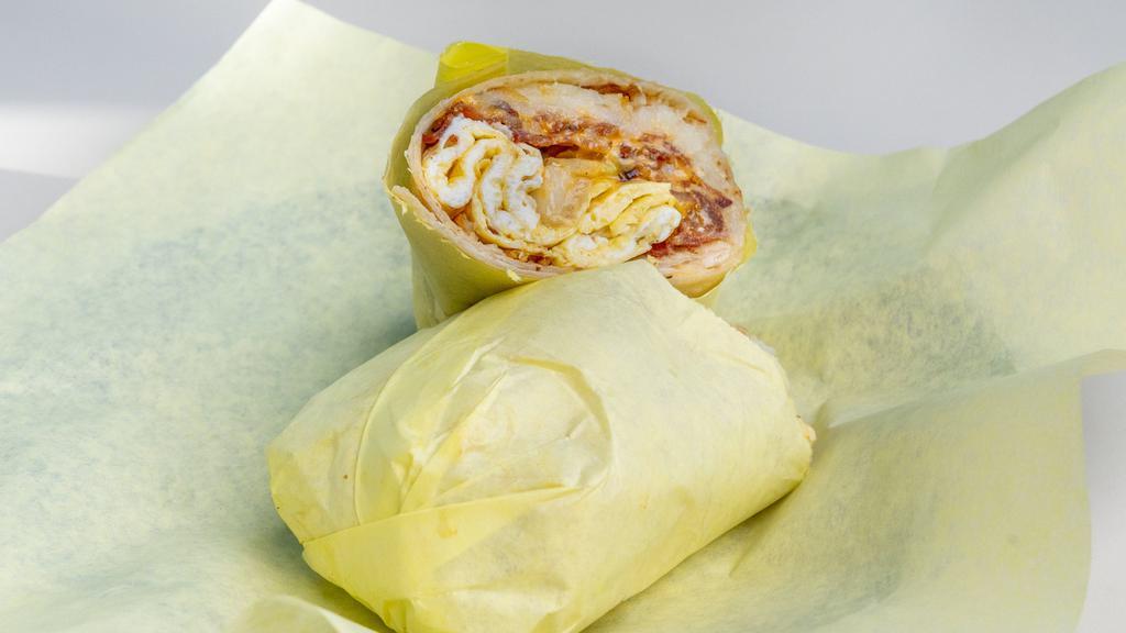 Breakfast Burrito · Choice of ham, bacon, or sausage, on hash brown, cheese, and egg.