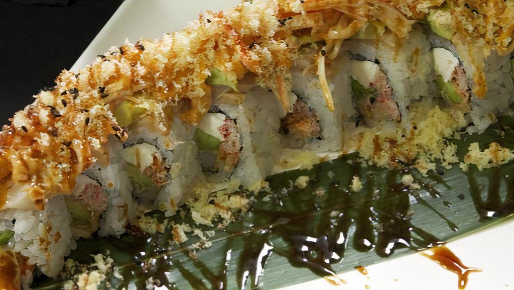 Dream Roll · Jumbo shrimp tempura, snow crab, albacore avocado. cream cheese, topped with spicy crab and shrimp tempura mix.