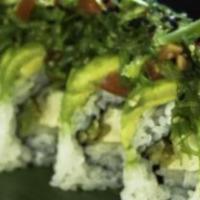 Green Sea Monster Roll · Tempura tofu, green onion topped with avocado, tomato, and seaweed salad.