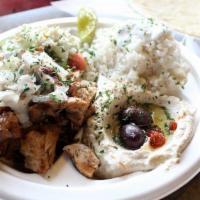 Chicken Shawarma Plate · Thin slices of chicken thigh shaved off the rotisserie, then grilled to perfection, placed i...