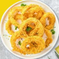 Crispy Onion Rings · Sliced onions dipped in a light batter and fried until crispy and golden brown.
