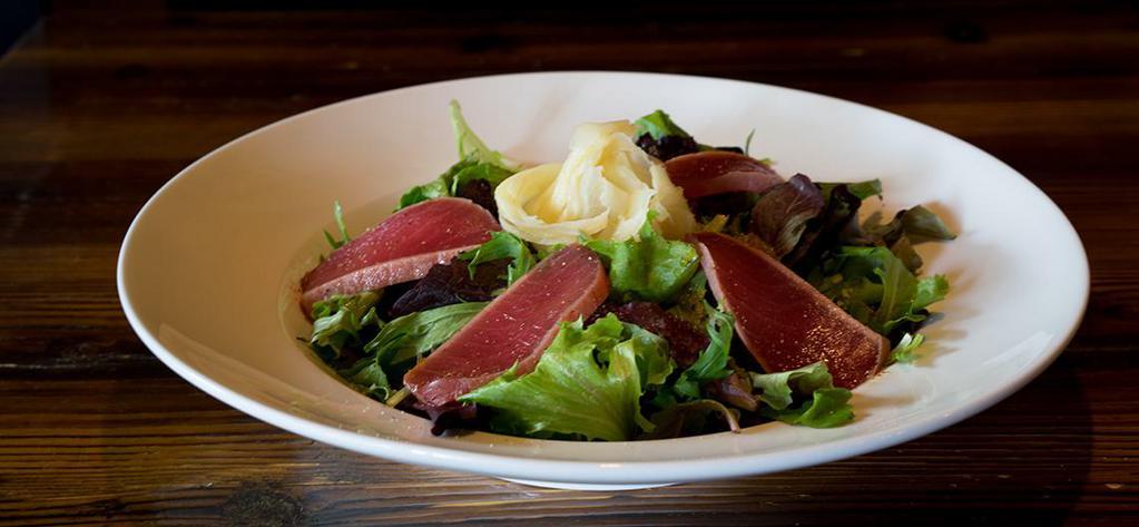 Tuna Tataki Salad · Seared ahi tuna with truffle ponzu soy sauce. Served on a bed of spring mix salad.

Consuming raw foods may increase your risk of food-borne illness.