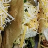 Tacos · Choice of Meat freshly prepared and cut romaine lettuce tomatoes onions cilantro served in a...