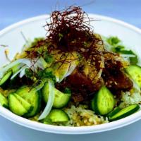 Spicy Tuna · Tuna marinated in a spicy poki sauce served with cucumbers, sweet onions, green onions, choi...