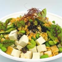 Sweet Ginger Tofu · Organic Tofu tossed in sweet soy served with edamame, hijiki salad, lotus roots, cucumbers, ...