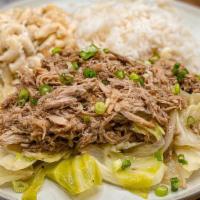 *Kalua Pig · Slow cooked shredded pork with steamed cabbage