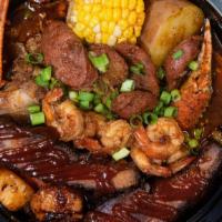 Steam Plate · Choose three meats. Item comes with Je's fried rice half corn cob, and red potato. Broth or ...