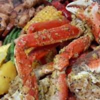 Catch Of The Day Seafood Boil · Feeds 3-4. Includes crab cluster (3), shrimp (15),  sausage (6), corn (6), potatoes (10), cr...