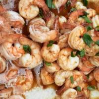 Je'S Shrimp & Grits · Creamy buttery house grits loaded with peeled large sautéed shrimp, bacon and house 