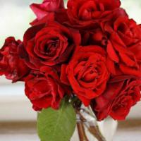 The Vamp · A sultry all red rose bouquet. The variety of roses is based on what is currently in bloom o...