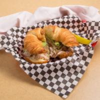 Croissant Delight · Turkey, bacon, avocado, Swiss cheese, sprouts, tomato, and mayo.