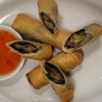 Golden Elysium Rolls · 4 deep-fried handmade rolls filled with cabbage, carrots, and glass noodles, wrapped with la...