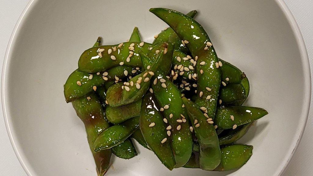 Juicy Sweet Edamame  · Organic soybean pods (about 3oz) tossed with house tamarind sauce, topped with sesame seeds and salt.