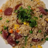Chinese Sausage Fried Rice · Savory fried white rice with sweet and smoky pork Lap Cheong (Chinese sausages), eggs, peas,...