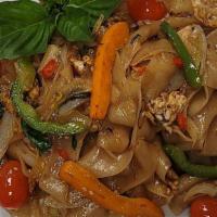 Thai Drunkard’S Noodles · Spicy ＆ savory stir-fried wide rice noodles with eggs, basil leaves, onions, bell peppers, a...