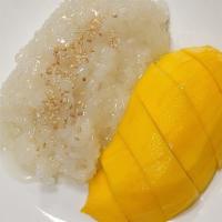 Mango Sticky Rice · Sliced ripe mango, served with lightly sweetened creamy coconut sticky rice topped with sesa...