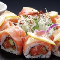 Orange Lemon · Spicy salmon and cucumber wrapped with salmon lemon and kaiware. Sliced onion accompaniment ...