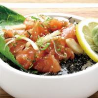 Salmon Poke Bowl · Salmon pieces in our homemade sauce served over rice.