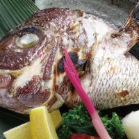 Salted Red Snapper Head · The cheek flash is one of the most tender and tasty parts of the dish.