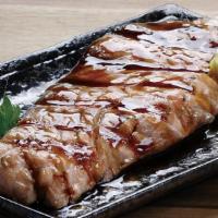 Teriyaki Salmon · Each Salmon fillet is hand cut and grilled with our original teriyaki sauce.
