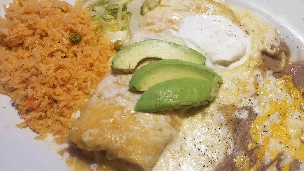 Chimichanga · Served with rice and beans.