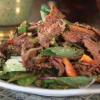 Beef Salad · Charbroiled Beef With Cucumbers, Red Onions, And Tomatoes In A Spicy Sauce.