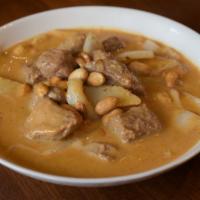 Mussaman Curry · Spicy beef curry with coconut milk, potatoes,  peanuts, and onions.