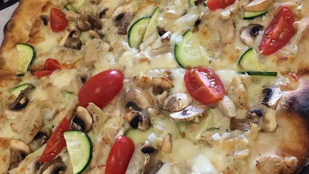 Garlic Chicken Pizza · Garlic sauce, five cheese blend, fresh mozzarella, chicken, mushroom, onion, zucchini, tomatoes.