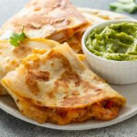 Shrimp Quesadilla · Sea fresh shrimp, red sauce and cheese folded into this quesadilla. Includes guacamole and s...