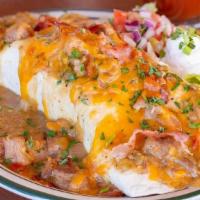 Breakfast Burrito · Potato, Egg, Cheddar, choice of Bacon or Sausage with Pork Green Chili