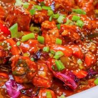 Chicken Manchurian · Chicken breast cooked with Chinese batter mixed with manchurian sauce and Chinese herbs