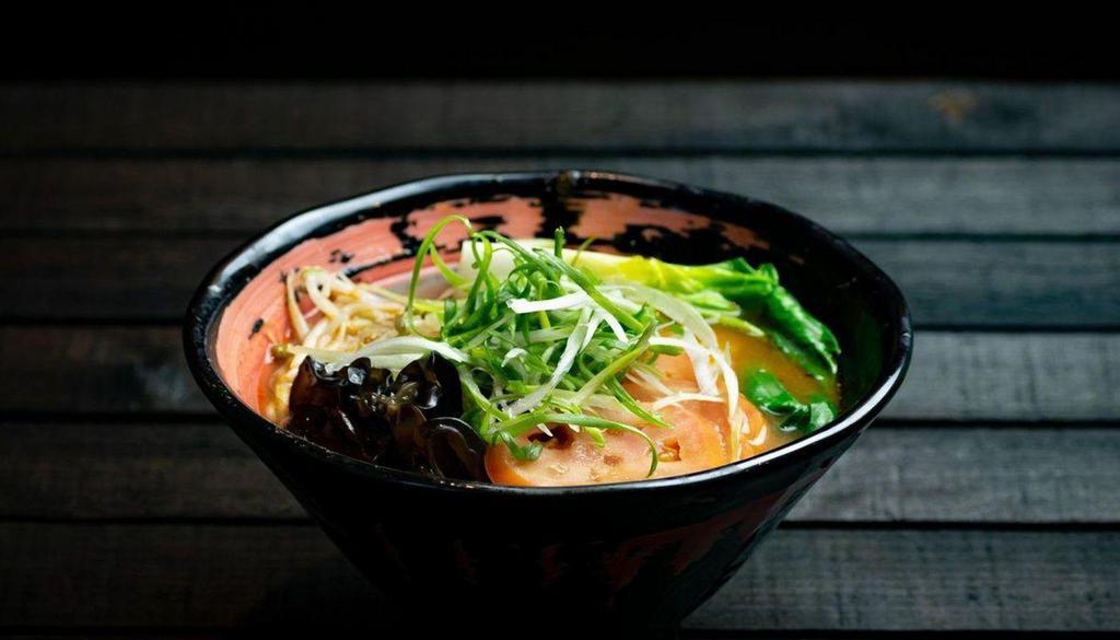 Vegetable Ramen  · Our vegetable ramen option is a soy bean broth with a light garlic and onion base. Nicknamed “The Vegeta-bowl”. Toppings: Tomatoes, wood ear mushrooms, bamboo shoots, bean sprouts, boy choy, julienned green onions, and chili threads