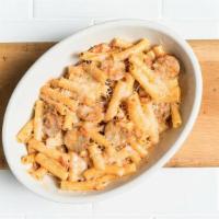 Baked Ziti With Italian Sausage · Grilled Italian fennel sausage and tomato-cream sauce. Baked with parmesan.