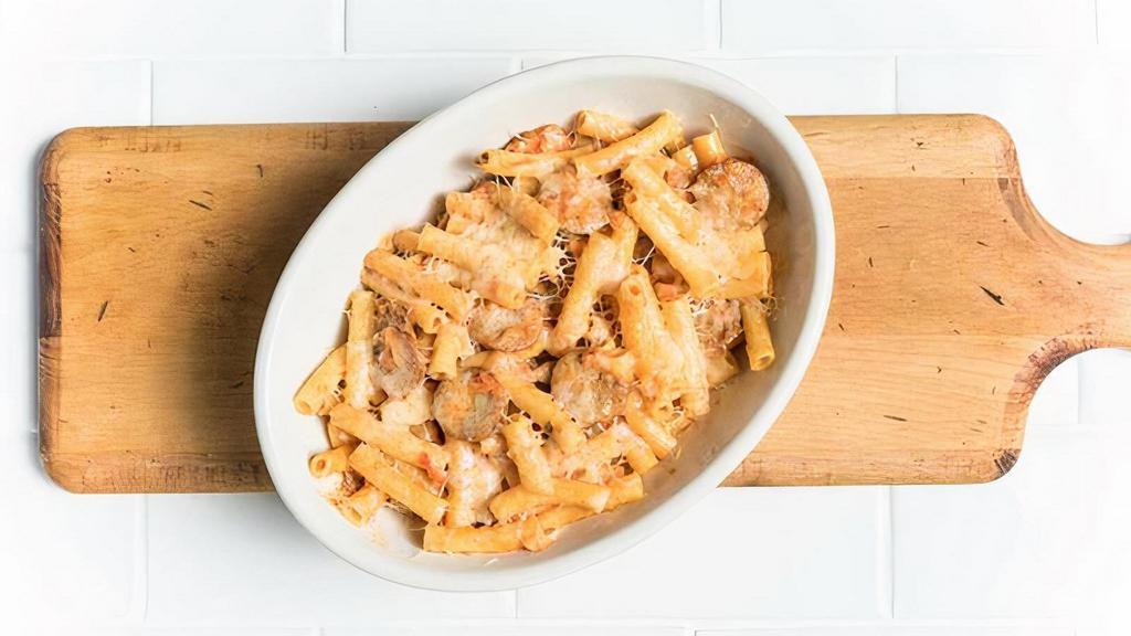 Baked Ziti With Italian Sausage · Grilled Italian fennel sausage and tomato-cream sauce. Baked with parmesan.