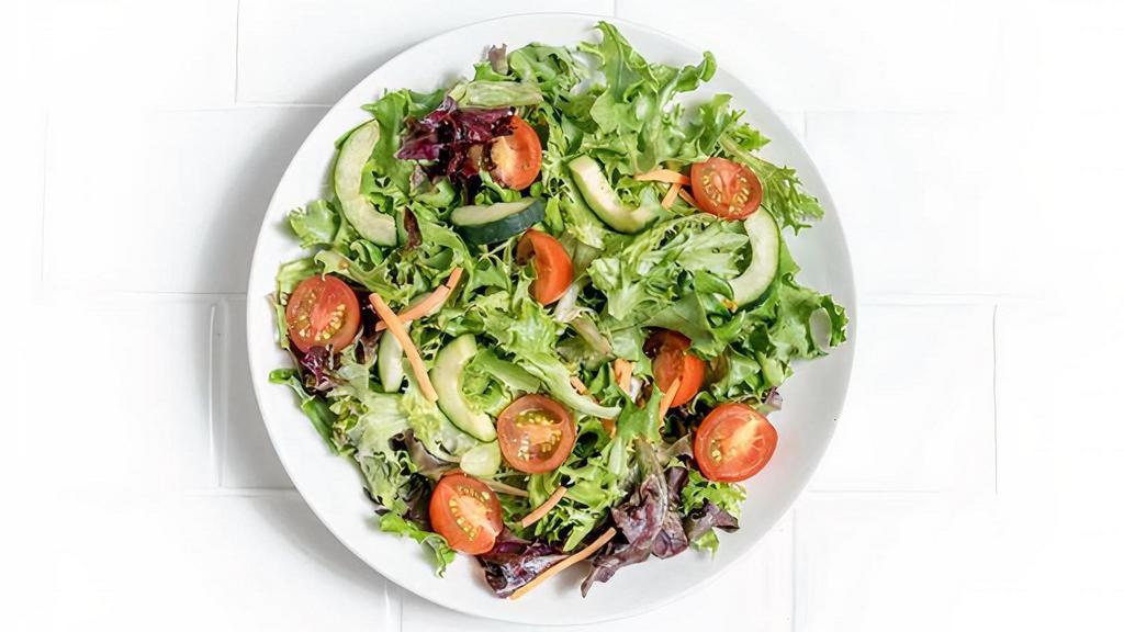 Field Greens · Cherry tomatoes, carrots, cucumbers, and roasted tomato vinaigrette.