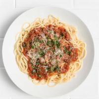 Spaghetti Marinara · Slow-simmered plum tomatoes with garlic, oregano, and fresh basil.