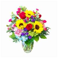 Bold Mix By Arrowhead · A stunning arrangement filled with a variety of fresh cut, bold colored flowers. Depending o...