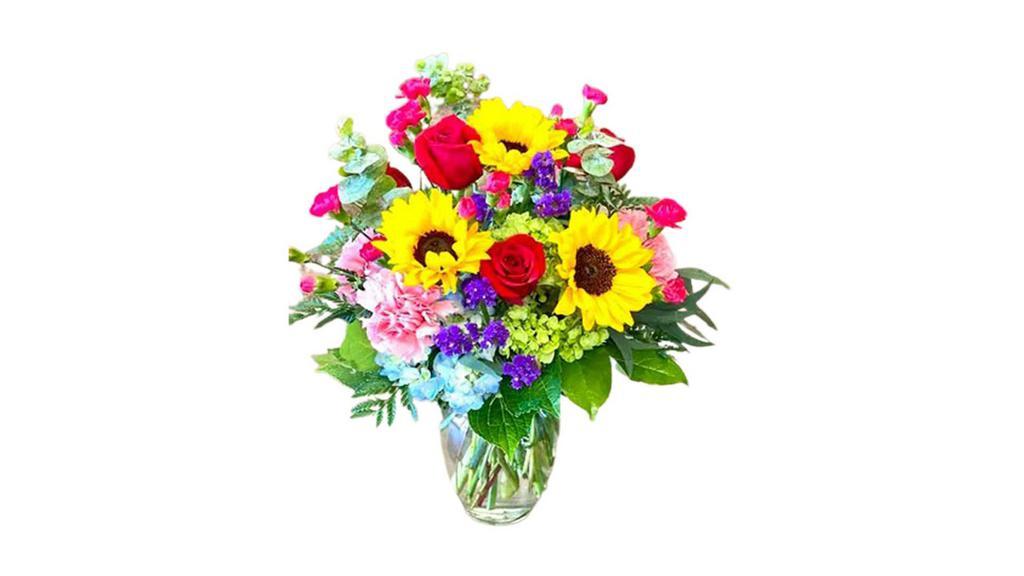 Bold Mix By Arrowhead · A stunning arrangement filled with a variety of fresh cut, bold colored flowers. Depending on product availability, some substitutions of flowers and containers may be necessary. For specific orders, please call. All prices in USD.