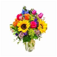 Arrowhead Exclusive 1000 · 6 hot pink and orange roses, 3 sunflowers, 2 green hydrangeas and fillers. Depending on prod...