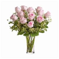 A Dozen Pink Roses · Pretty, pink and perfect. There's nothing like long-stemmed pink roses to show your affectio...
