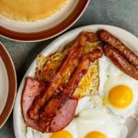 Country Boys Big Breakfast · Ham, bacon, and sausage, served with three eggs, home fries, two pancakes, and a buttermilk ...