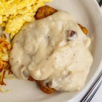 Chicken Fried Steak & Eggs · Breaded beefsteak topped with gravy, served with two eggs, any style.