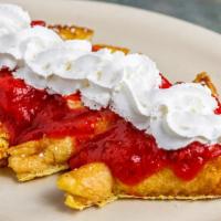 Strawberry French Toast · Topped with strawberries and whipped cream.
